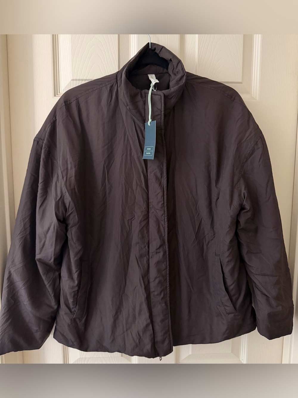 We Wander Puffer Jacket size small NWT